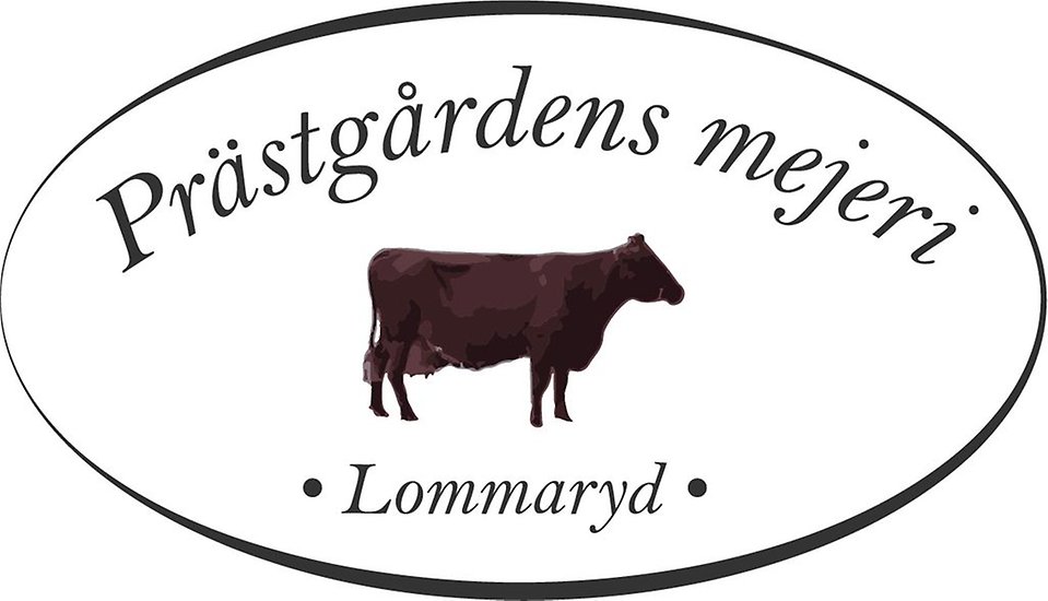 Logotyp för Prästgårdens mejeri med en brun ko i mitten, omgiven av en oval ram. Texten 'Prästgårdens mejeri' står upptill och 'Lommaryd' nedtill, med små dekorativa punkter på vardera sida.